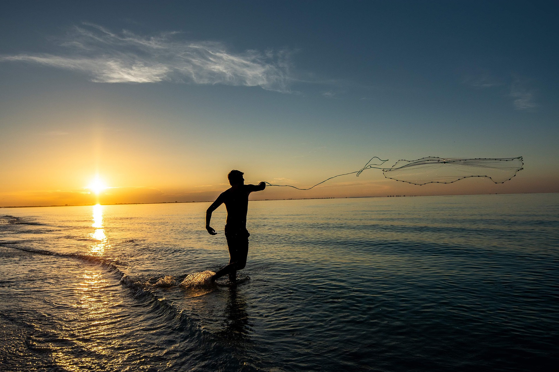 Pescador en Sanibel Island, playas en Florida